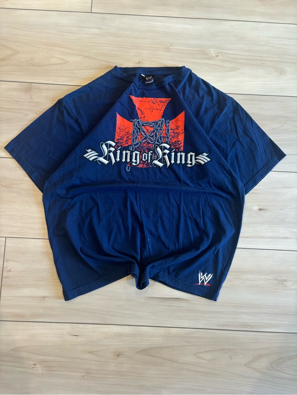 WWE Roman Reigns Men’s Navy Blue Tee with Red Crest "King of Rings"